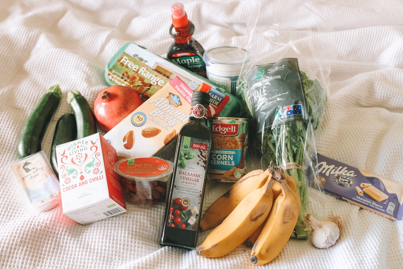 Fresh produce and groceries on a kitchen counter